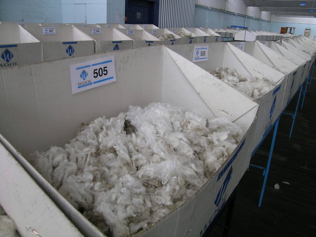 Merino wool samples in various textures from fine to coarse showing the range of fiber types both e-spinners and treadle wheels can handle